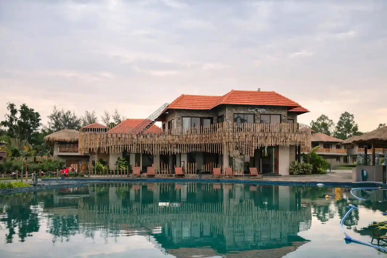 Hotel Sonar Bangla Sundarban luxury resort with swimming pool, cottages, and premium ambiance.