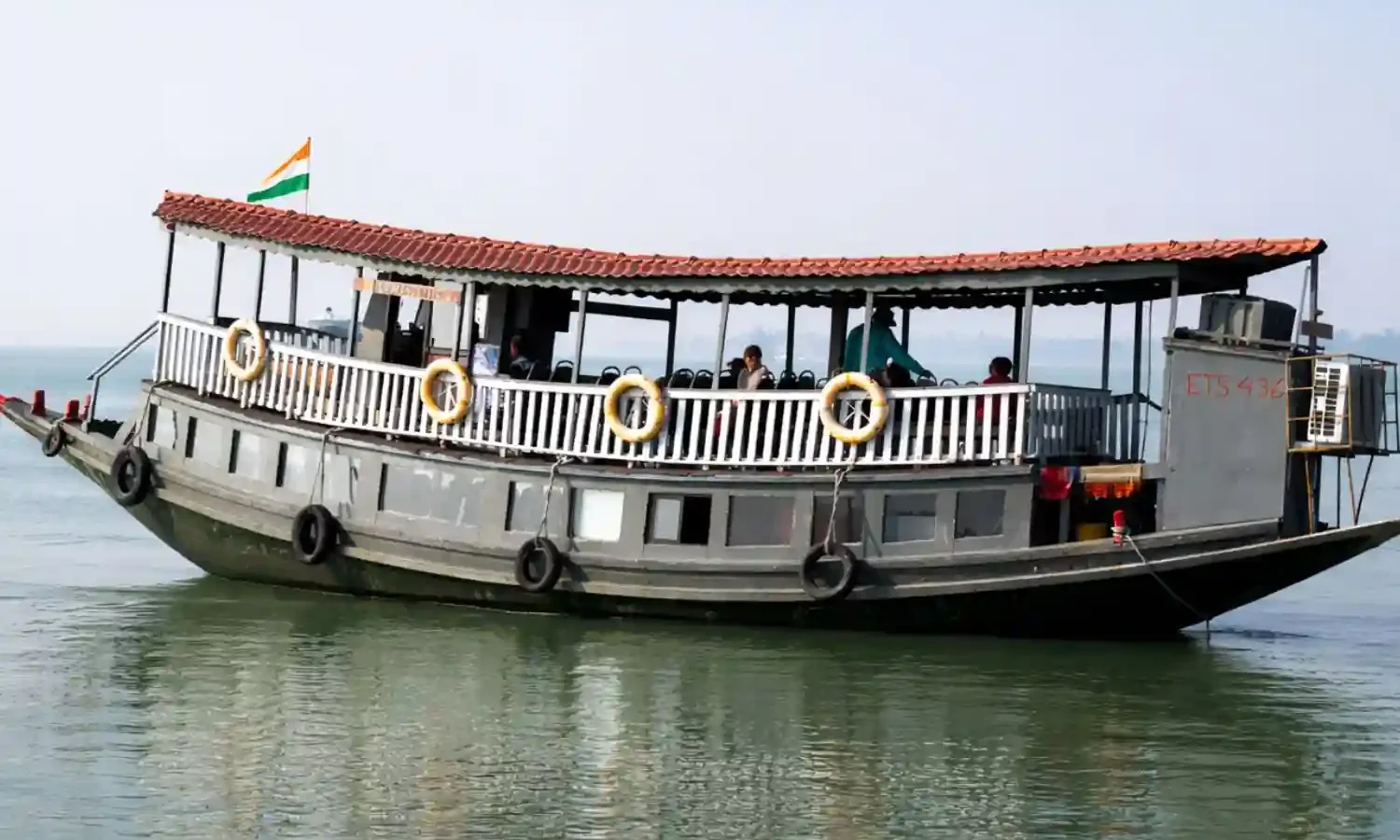 Luxury AC Boat Safari in Sundarban Luxury AC boat safari cruising through Sundarban rivers during Sundarban tour.